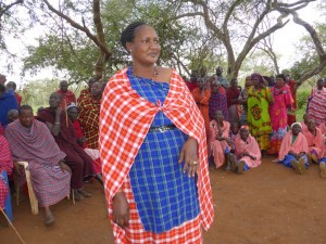 Even men are present at the women group meetings with Philomena Kiroya (February 2015)